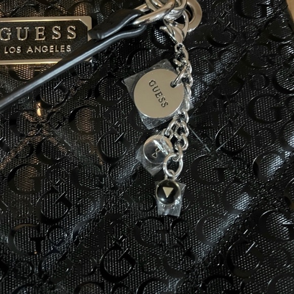 Guess Black shoulder bag. Like new! still has plastic on it and it’s authentic!! - Picture 5 of 8